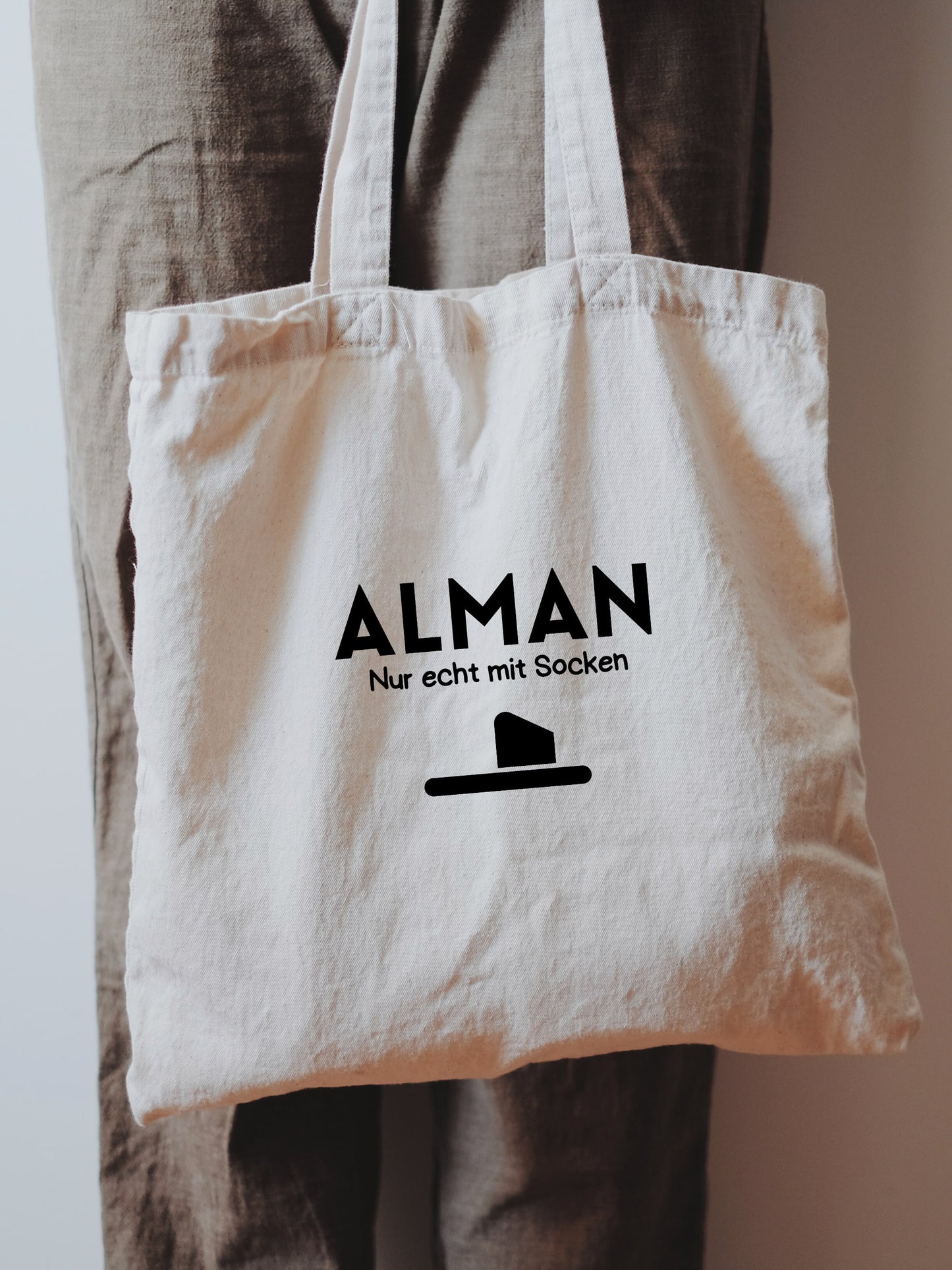 Baumwolltasche "ALMAN - Nur echt mit Socken"