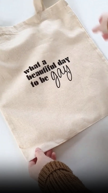 Baumwolltasche "what a beautiful day to be gay"
