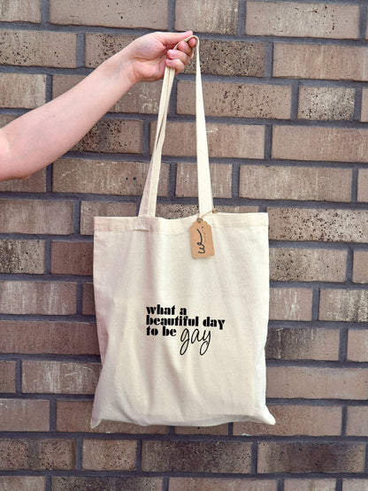 Baumwolltasche "what a beautiful day to be gay"